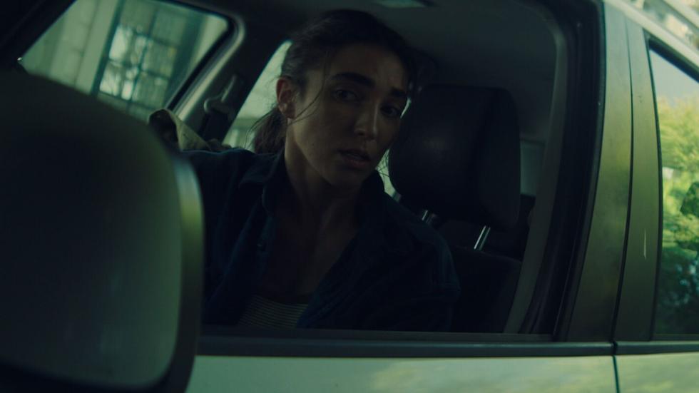 Olivia in her car