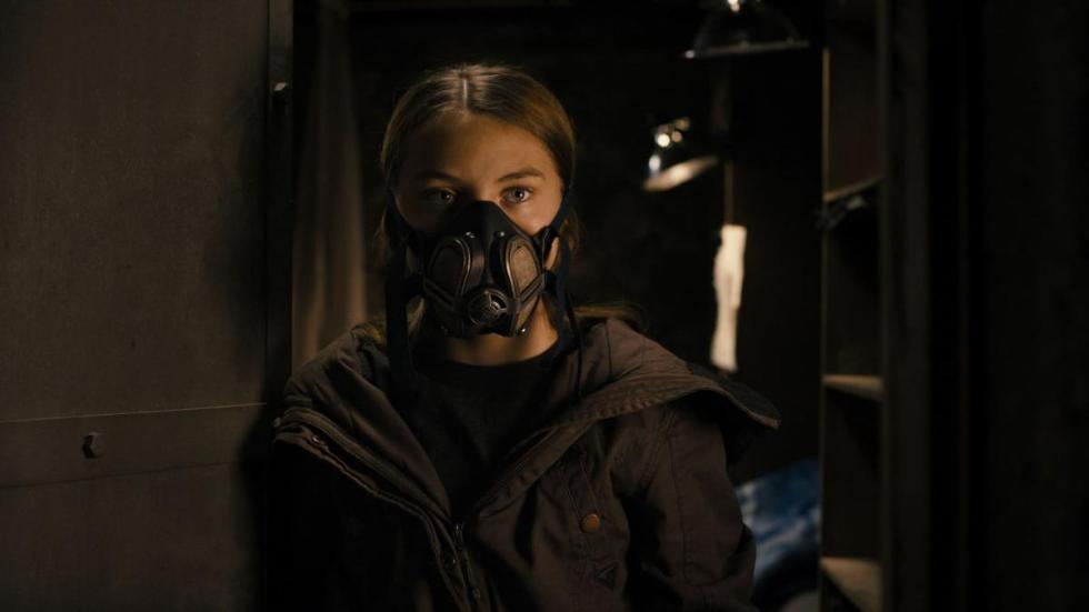 Monsters film still girl with mask on 