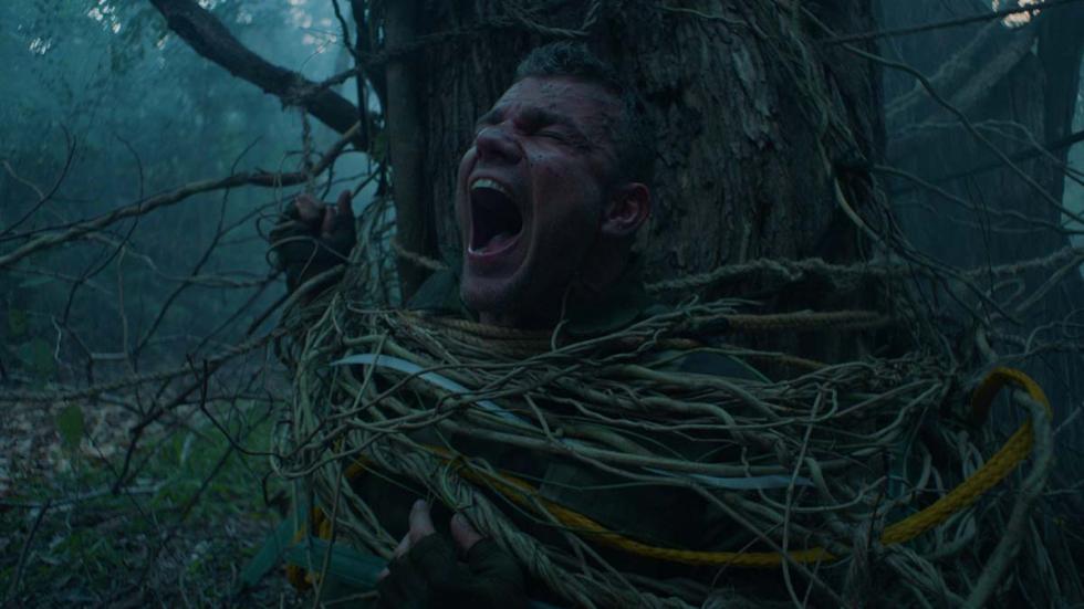 No Friend in the Forest film still man wrapped onto a tree by roots