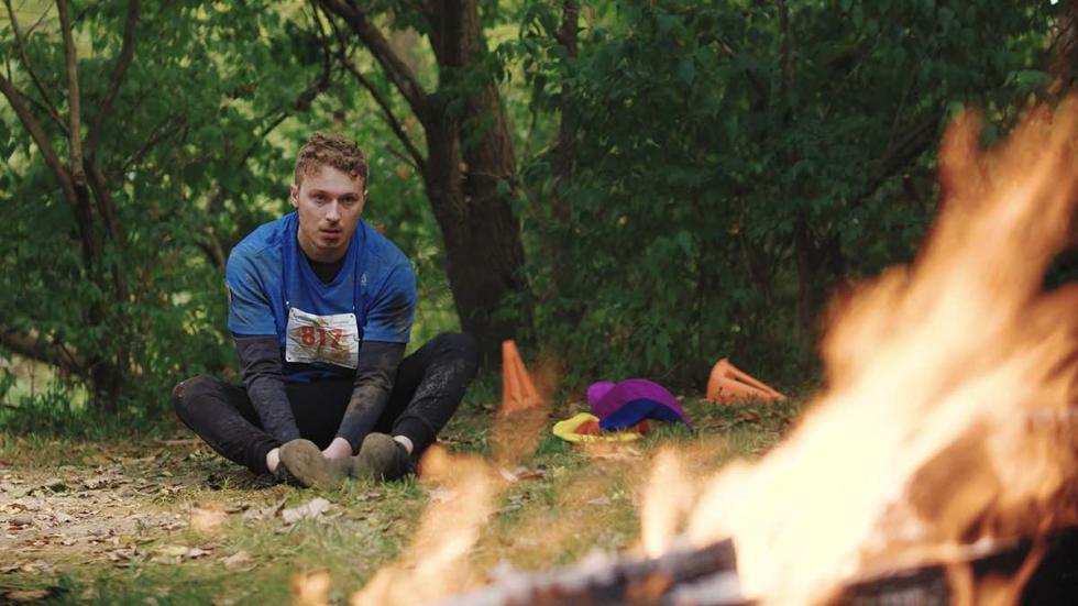  Obstacle Corpse Film still runner looking at a fire obstacle