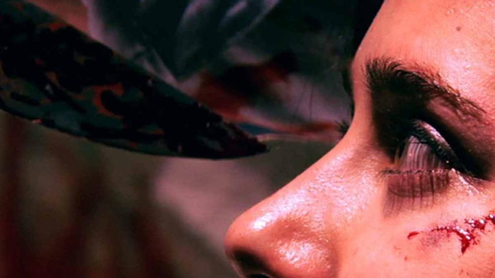 One More Time knife in front of woman's eye