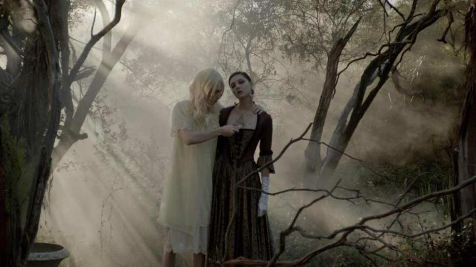 Orchard Girl film still women standing in the woods