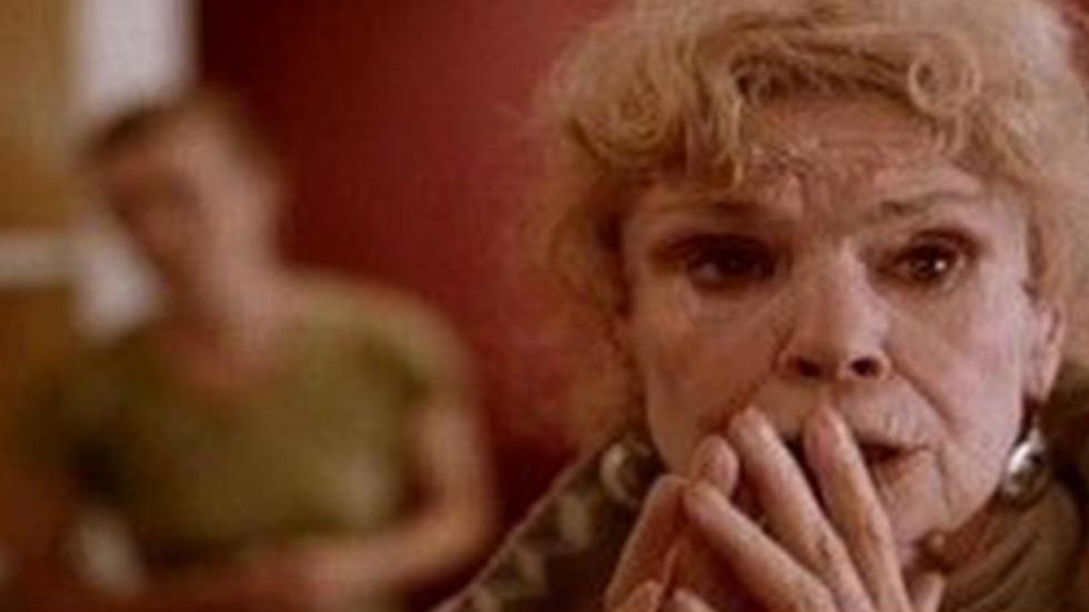 Penny Dreadful An older woman holds her hands to her face in fear