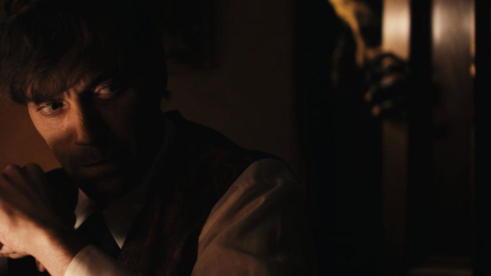 The Rickety Man film still man not sure of what he is seeing.