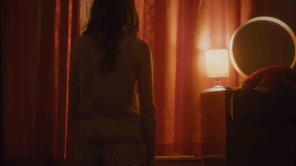 Real Gods Require Blood film still woman looks out the window