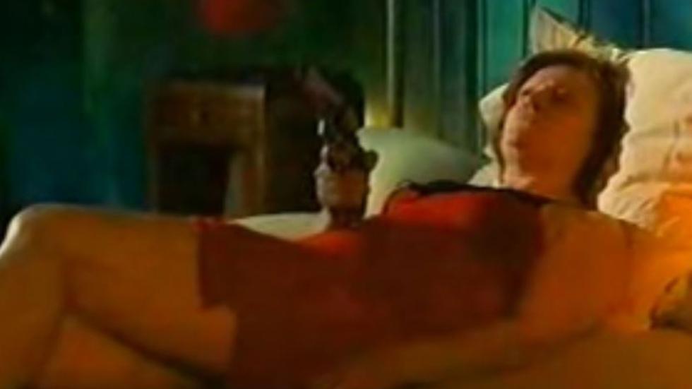 Don't Fuck with an Old Lady! Lady in the bed pointing a gun