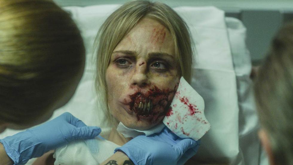 Rabid film still bloodied woman in hospital bed