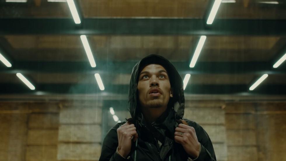 Rain Catcher film still man in hoodie