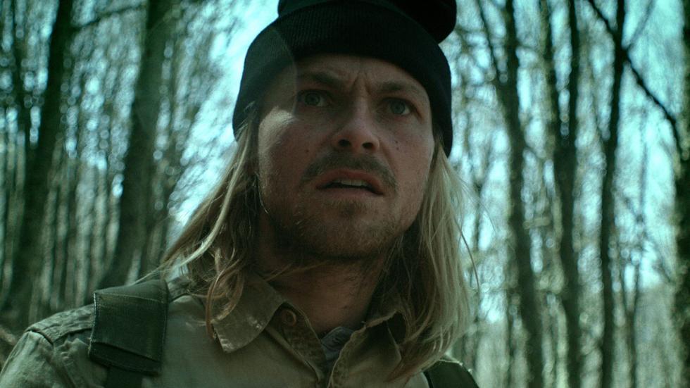 The Repeater film still man looking at something