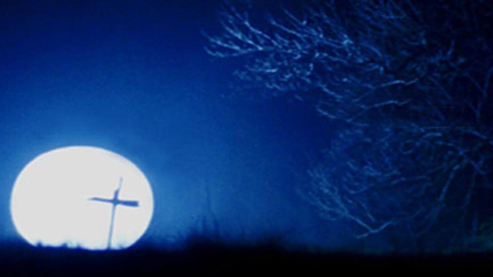 Ressurection Mary Cemetary grave with full moon