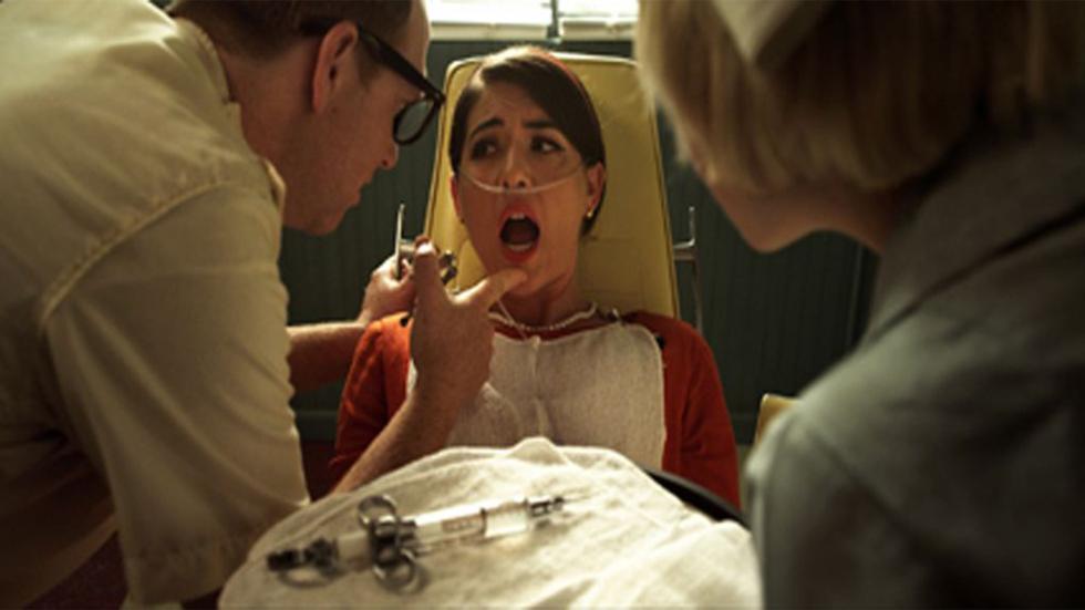 Root of the Problem young woman at the dentist