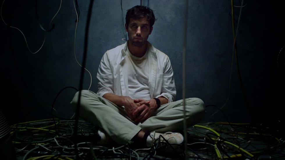 Mainline film still man sits in a room