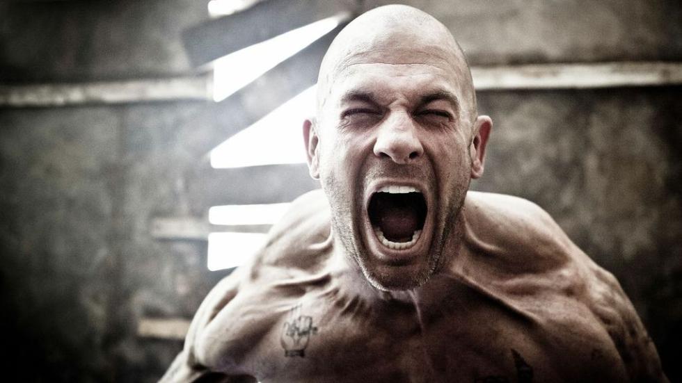 The Seasoning House man screams so hard his muscles flex