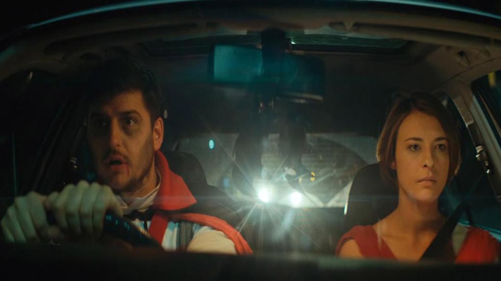 The Prey couple drives in a car