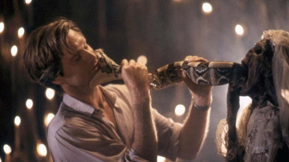 The Serpent and the Rainbow film still snake attacks mans face.