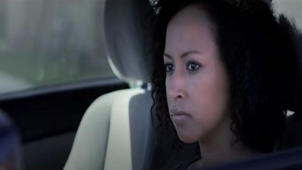 SEVER woman in her car stares at someone 