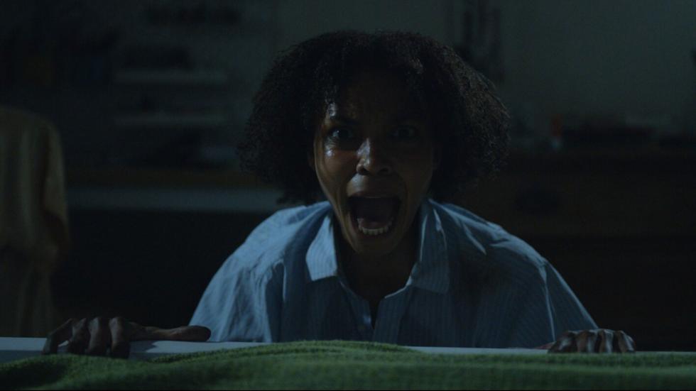 A woman screams