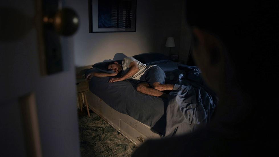 Sleep Talker film still woman in bed sleeping