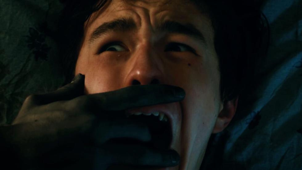 Spare Body film still creature hand covering mans mouth