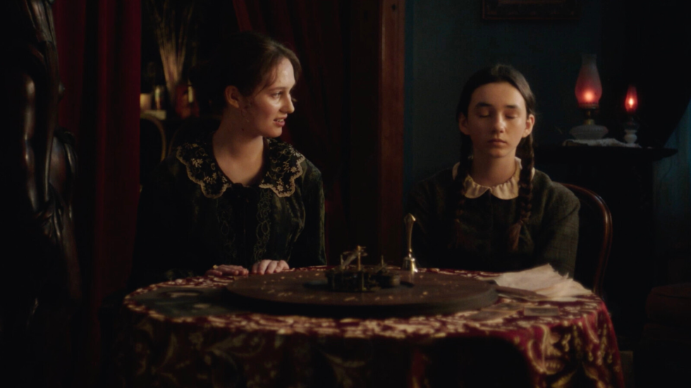 The Fox sisters hold a seance 