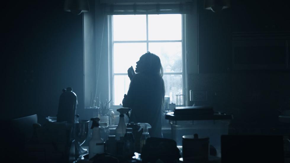 Spore film still woman standing at the window