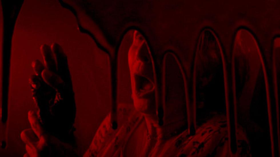 The Springfield Three film still woman in blood covered window.