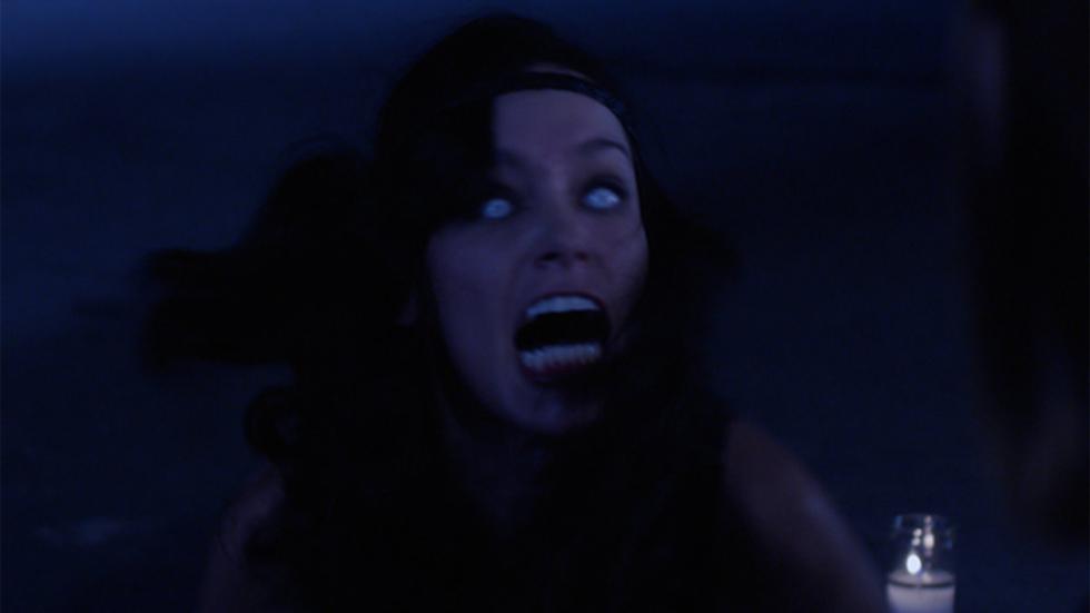 The Summoners demonic woman stares