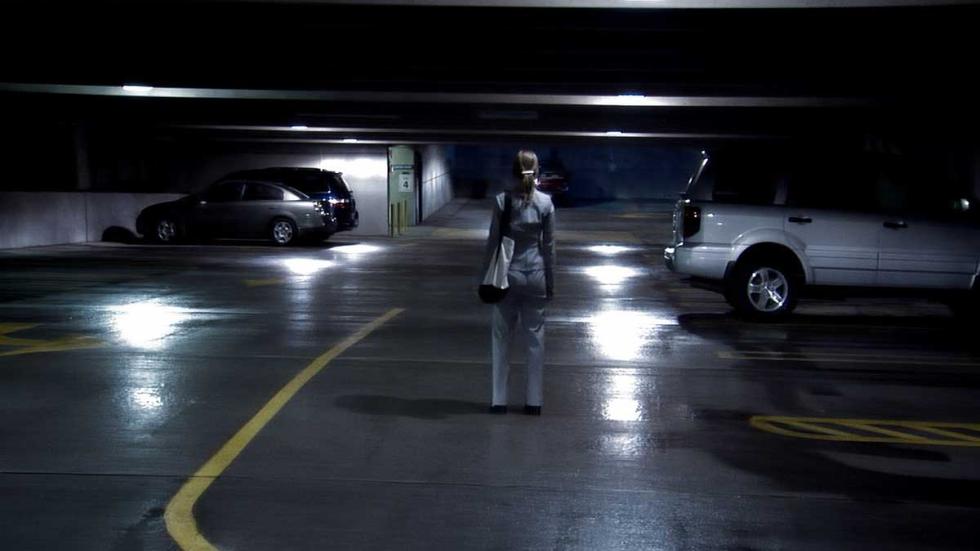 Take Out woman alone in a parking garage