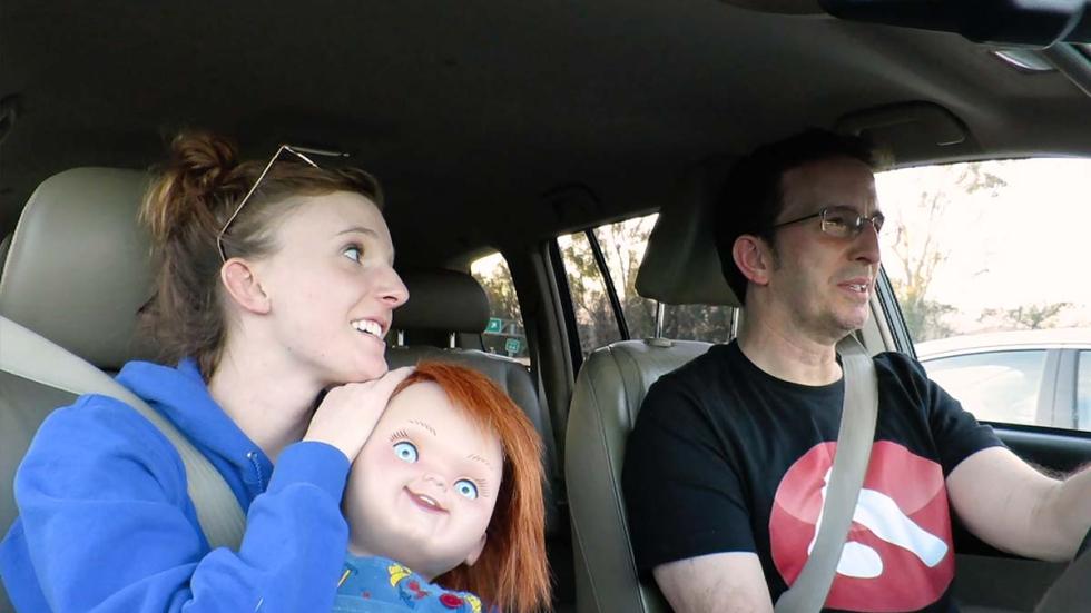 The Dollhouse film still driving in the car with Chucky