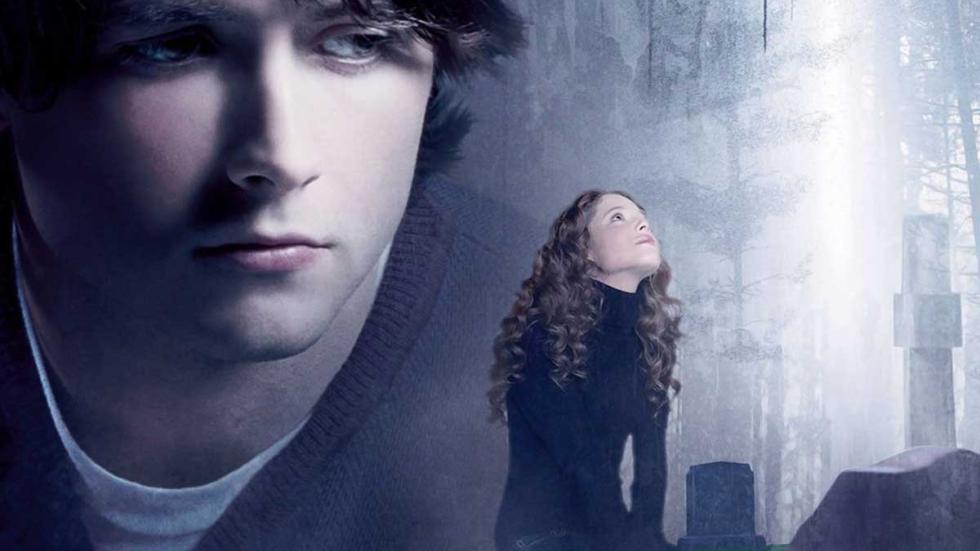The Invisible poster Nicklas with a woman in a cemetary