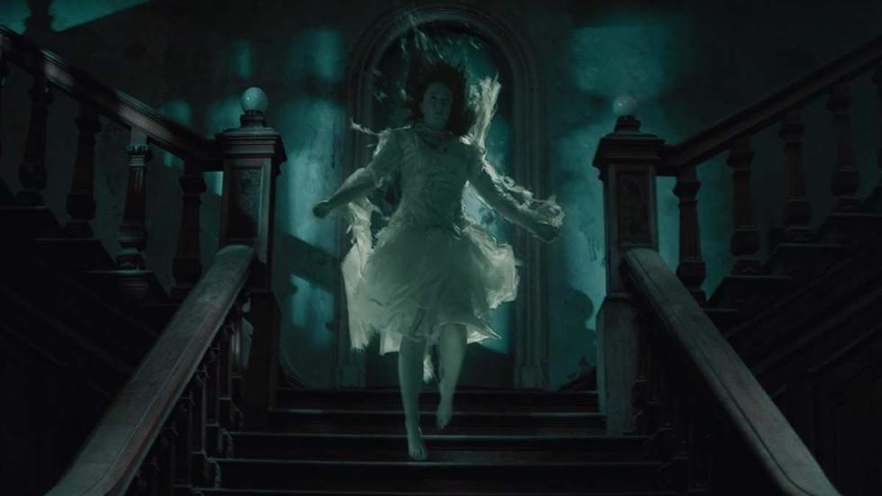 THE LODGERS film still female ghost floats down stairs