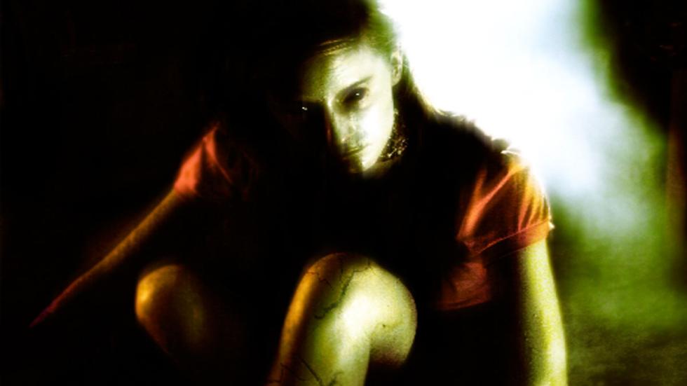 The Long Night woman looks on
