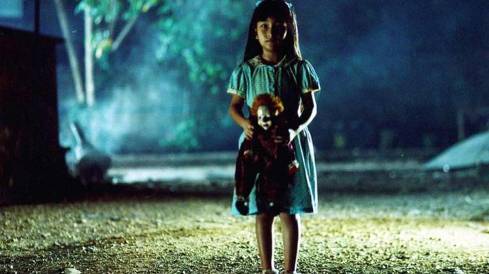 The Park (3D) A little girl holds a creepy clown doll