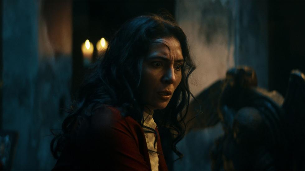 Carme looks on in fear