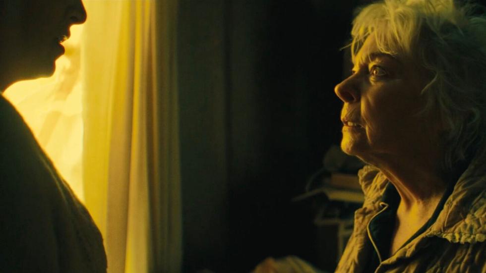 Homecare worker speaks with a woman with dementia