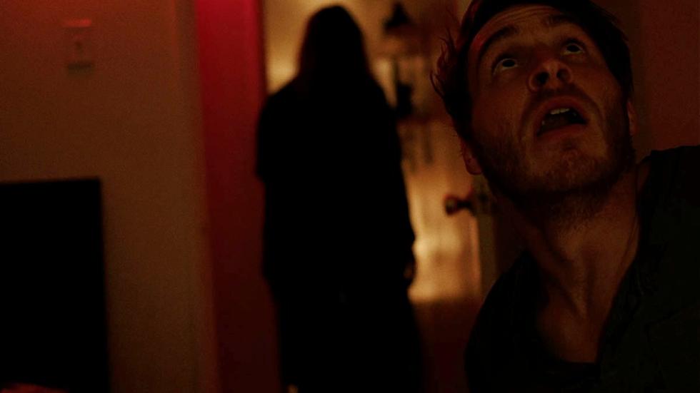 The Converted film still of a bloody man