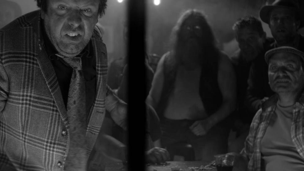 THE INCREDIBLE TALE OF THE INCREDIBLE WOMAN-SPIDER film still creepy men watching