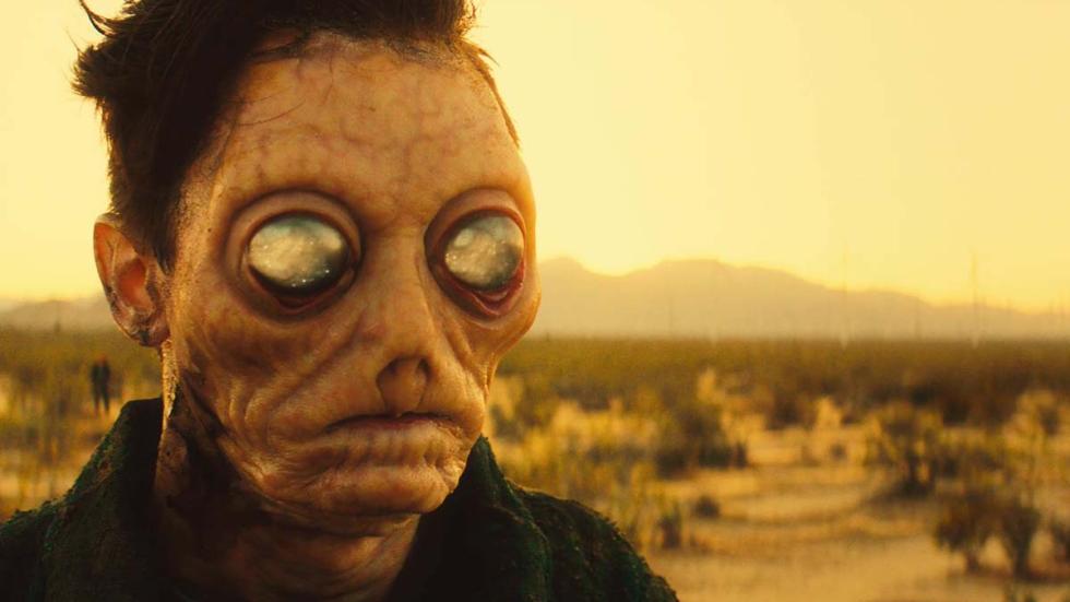 The Silver film still creature with big eyes