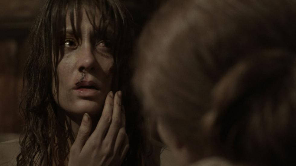 The Den film still bloodied nosed woman