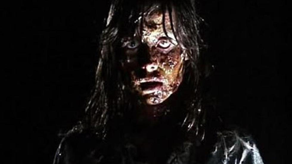 The Gates Of Hell bloodied face woman