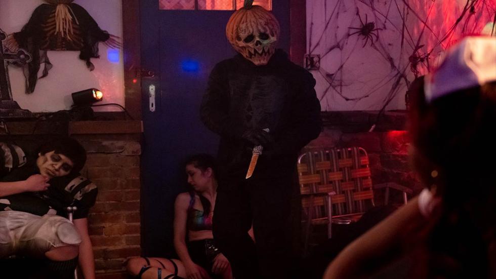 Trick film still Pumpkin masked killer with long knife