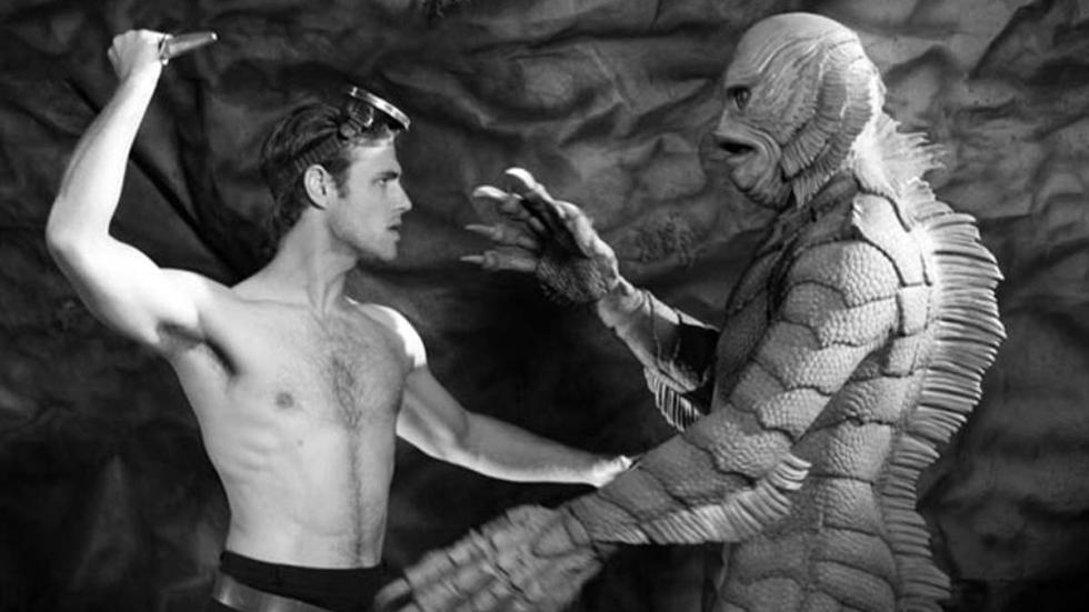United Monster Talent Agency man threatens creature from the black lagoon with a knife