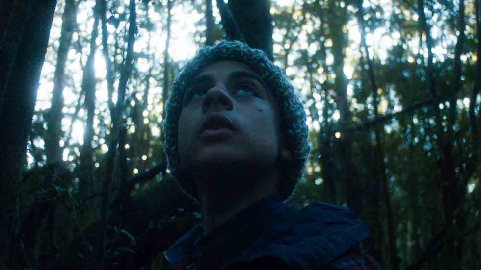 Hombre film still boy in the woods looks scared