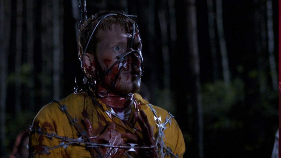 Wrong Turn 3: Left For Dead bloodied man chained up